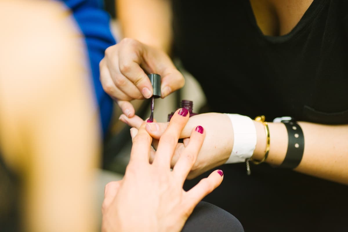 Professional nail technician tools laid out on a workspace