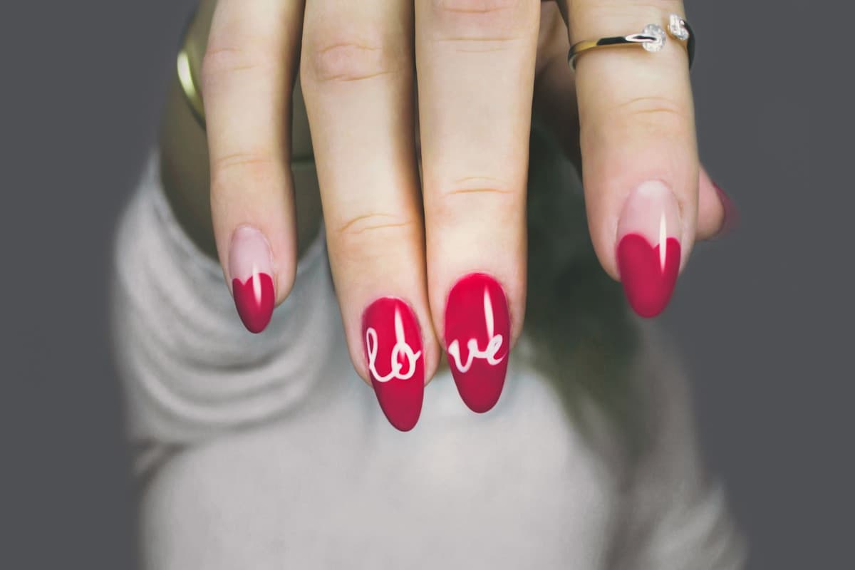 Home gel nail application setup with UV lamp and supplies